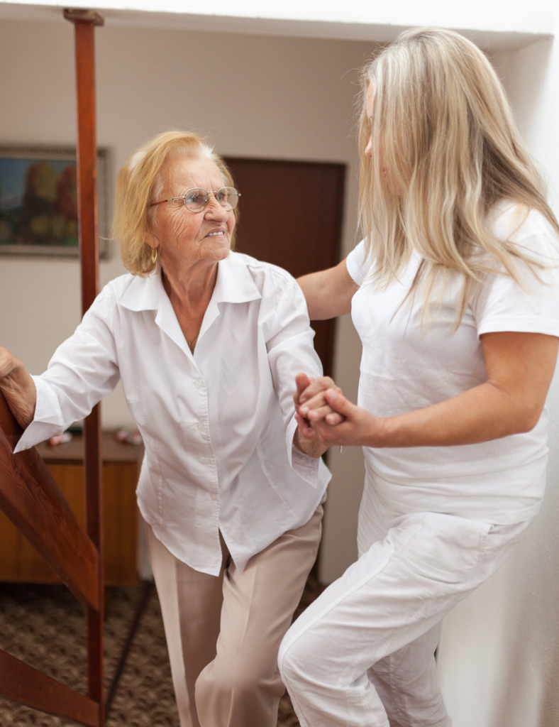 Instructor demonstrating safe manual handling techniques during the 1-Day Safer People Handling Awareness (SPHA) Course at First Aid England.